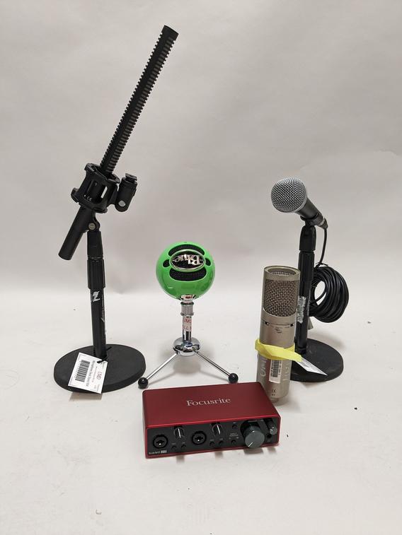 Four microphones for recording audio and podcasts