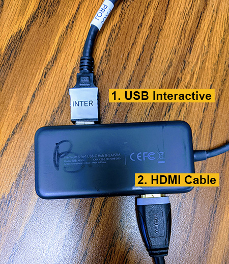 Photo: USB Interactive cable and HDMI cable connected to hub.