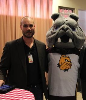 Photo: Jason Davis, with University of Minnesota Duluth mascot, Champ